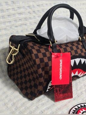 Sprayground Brown and Black Checkerboard Mini Bag with Shark Graphic